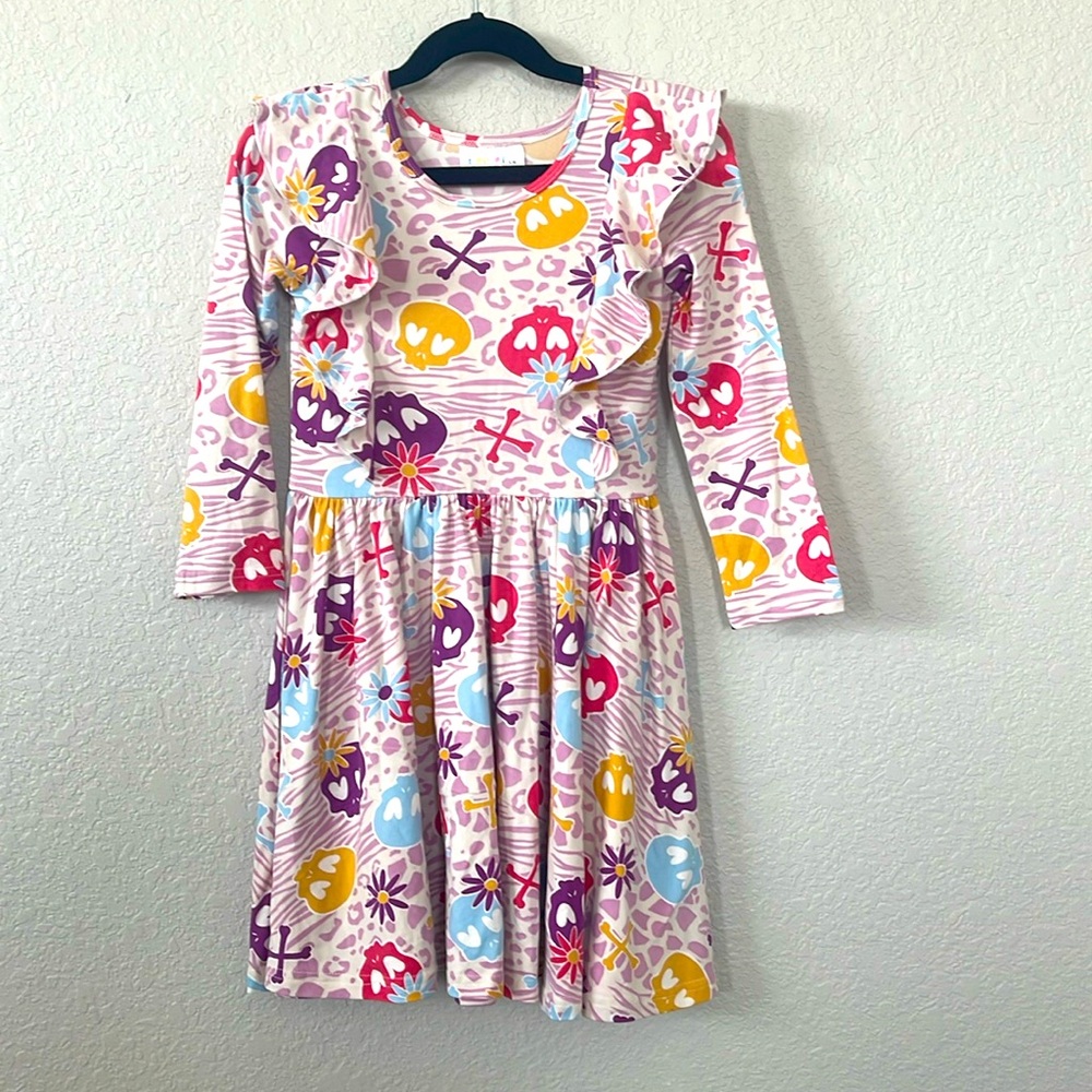 Dot Dot smile ruffle long sleeve Halloween twirl dress. Size 5/6 purple skulls